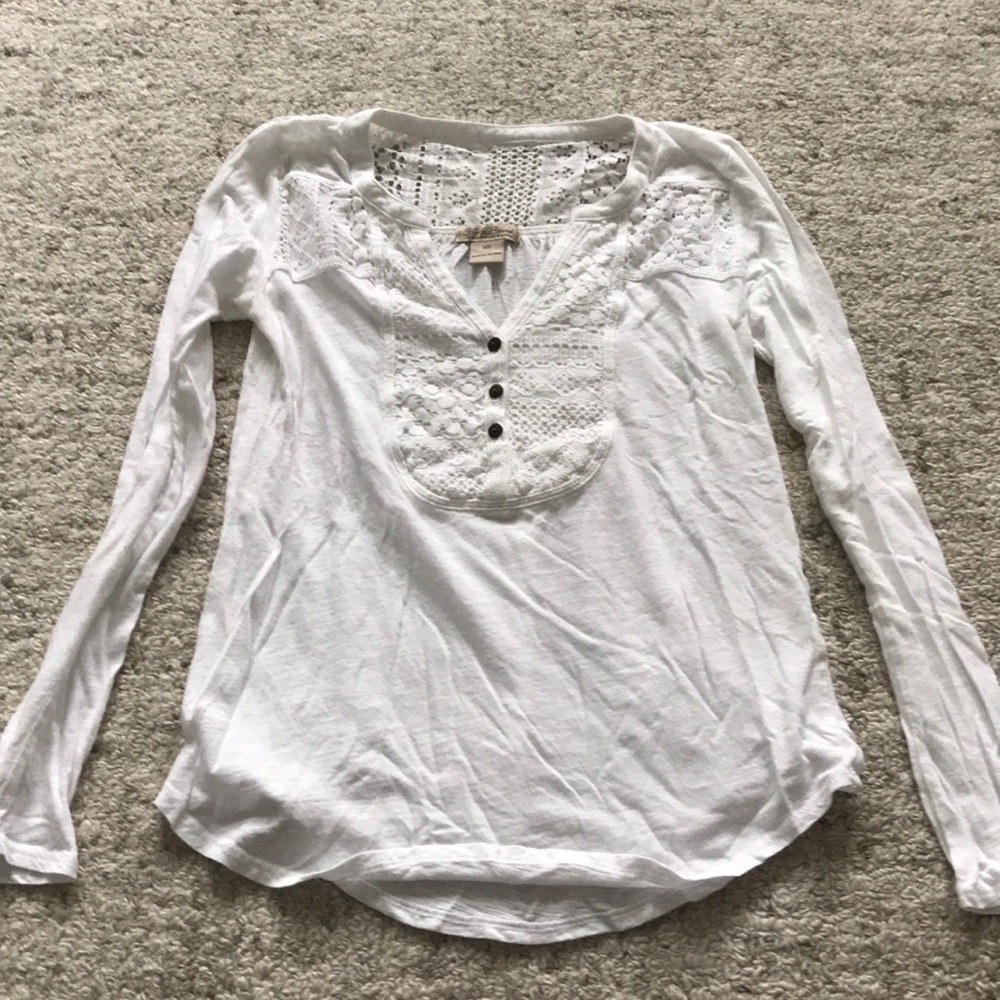 White long sleeve shirt with detailing on front